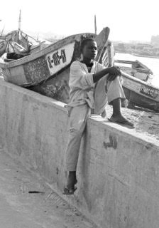 A snapshot taken through a car window in St. Louis, Senegal of the boy who would inspire Mor’s story.